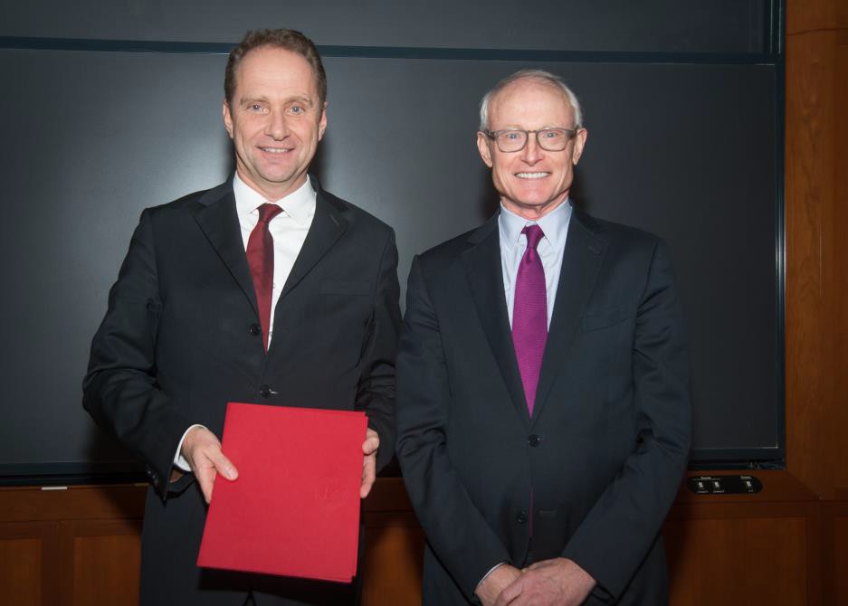 Prof. P. Gugler and Prof. M. E. Porter (Boston, December 2016)